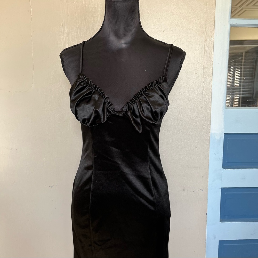 Black babydoll mini dress with ruffle detail